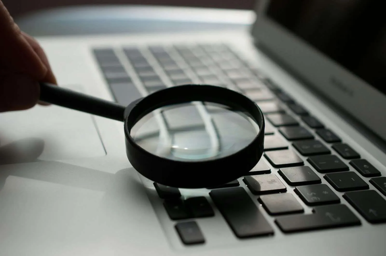 Magnifying glass on a laptop
